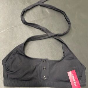Xhilaration black swimsuit top. NWT size medium (4-6)
